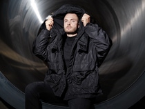 Young man with black loopamid® jacket